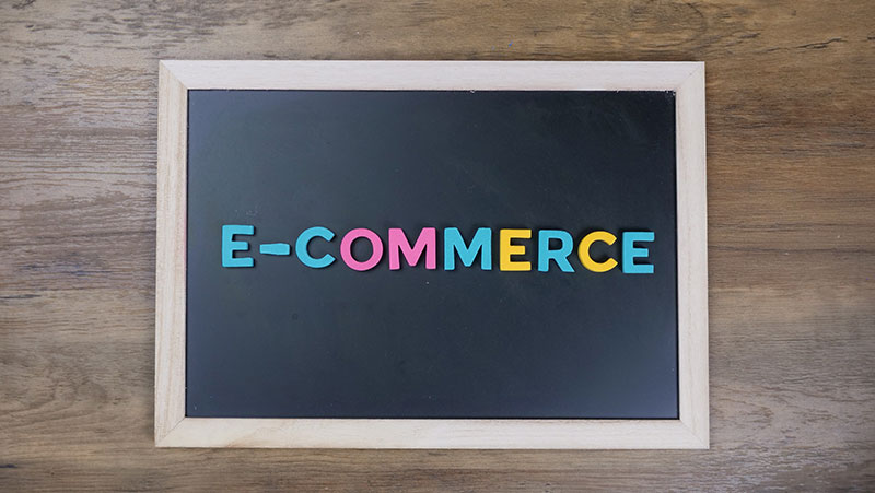 Chalkboard that says e-commerce in bright letters